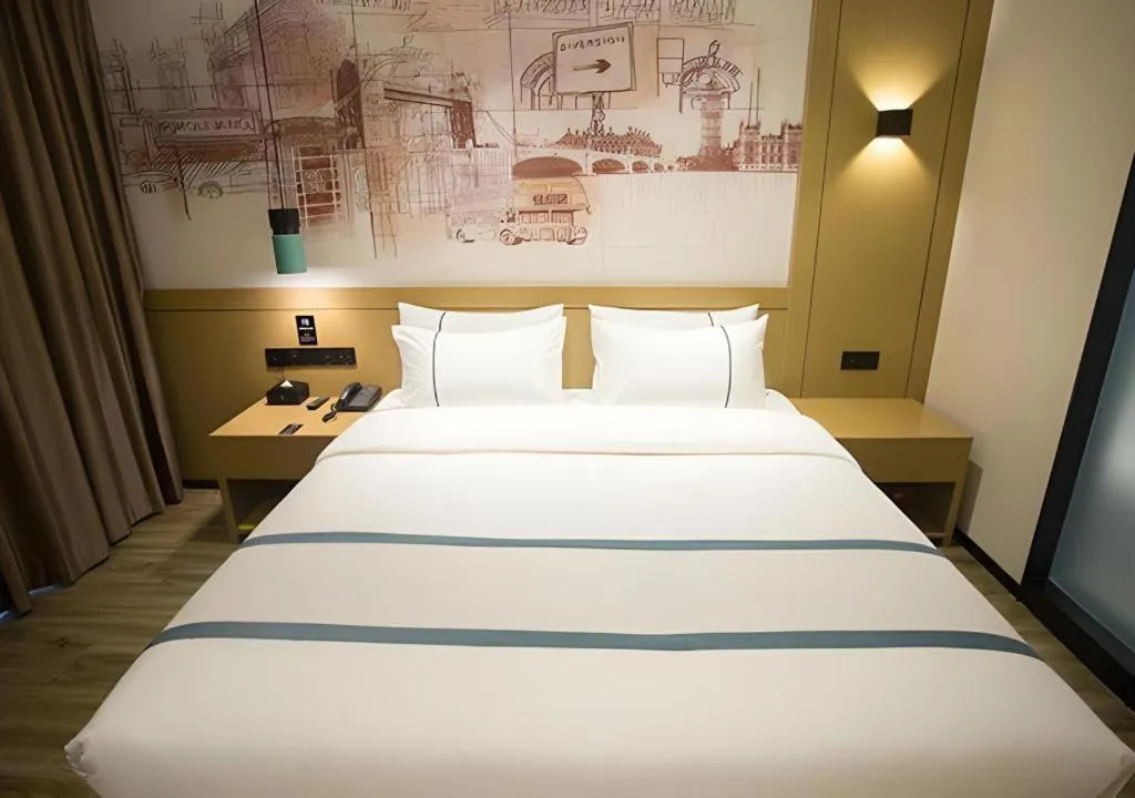 Bed in City Comfort Inn Taizhou Wanda Plaza