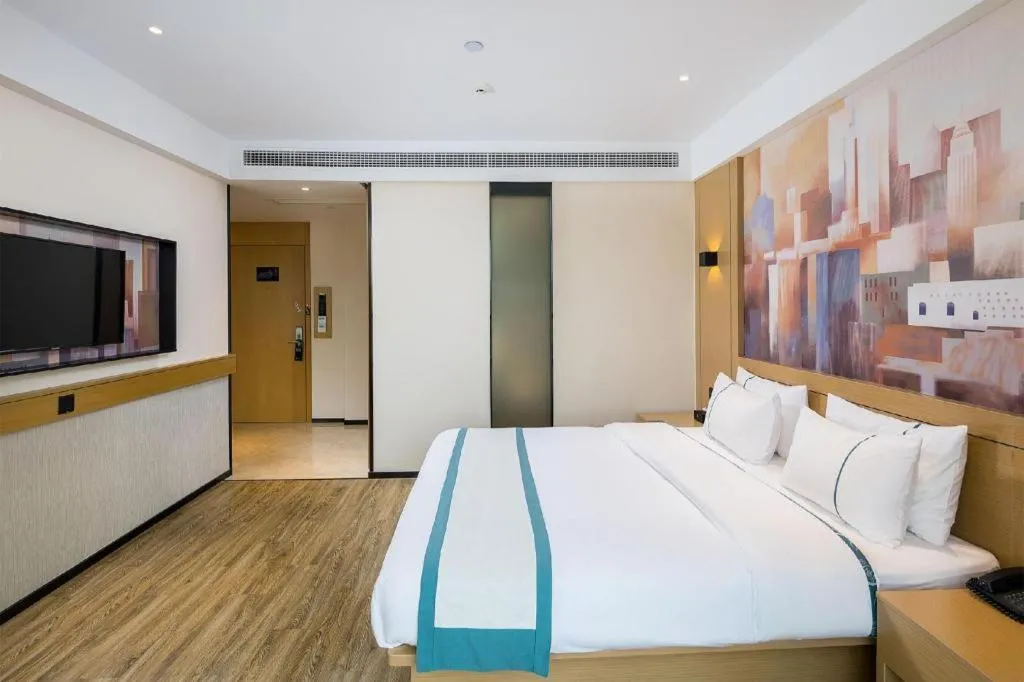 Bed in City Comfort Inn Taizhou Wanda Plaza