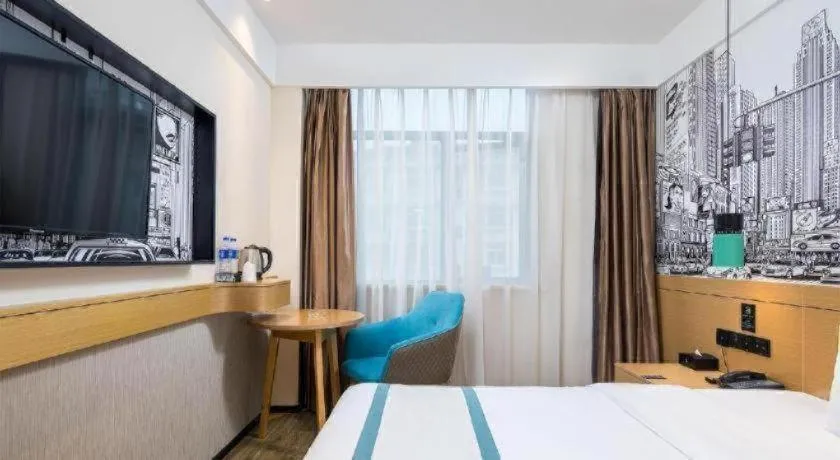 Bed in City Comfort Inn Taizhou Wanda Plaza