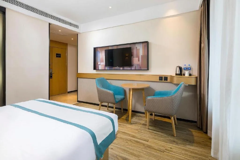 Bed in City Comfort Inn Taizhou Wanda Plaza