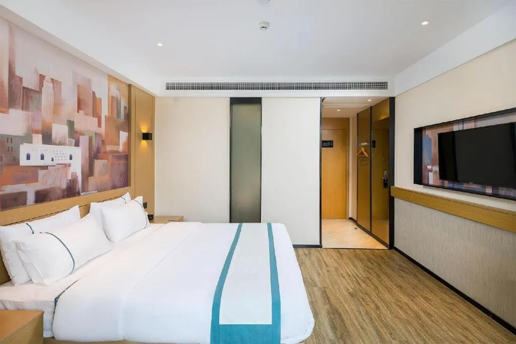 Bed in City Comfort Inn Taizhou Wanda Plaza