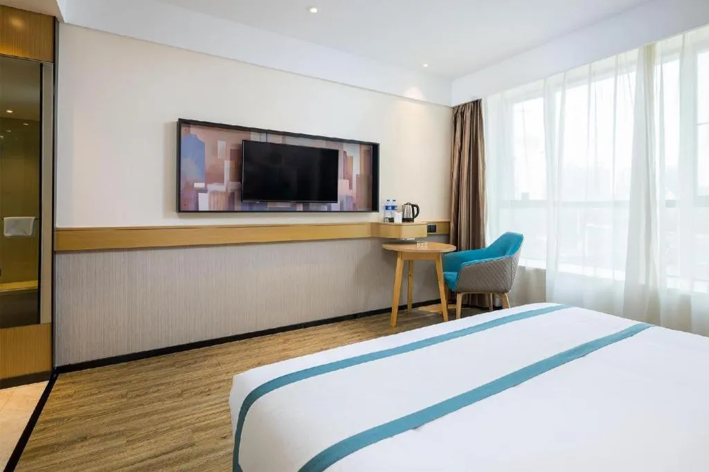 Bed in City Comfort Inn Taizhou Wanda Plaza