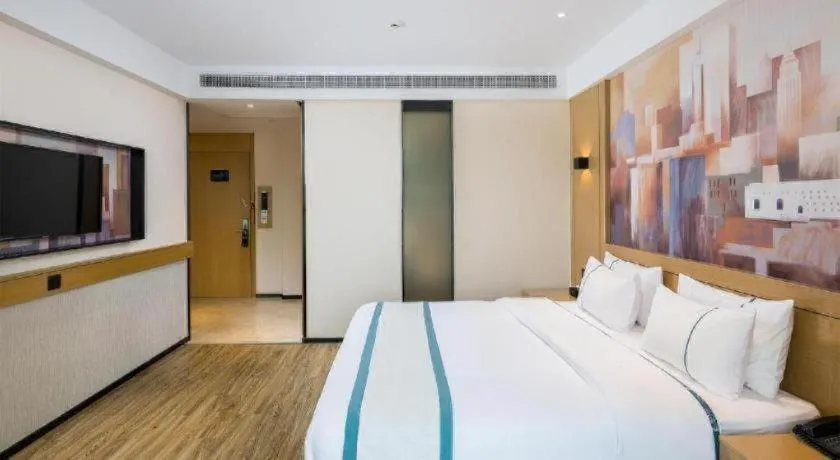 Bed in City Comfort Inn Taizhou Wanda Plaza