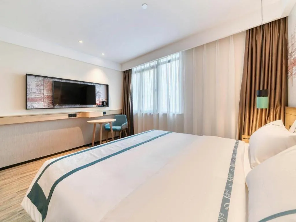 Bed in City Comfort Inn Changde Lixian Taohuatan