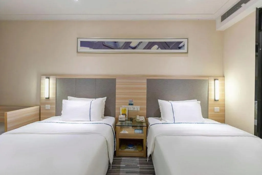 Bed in City Comfort Inn Hefei Binhu Wanghu Building Exhibition Center