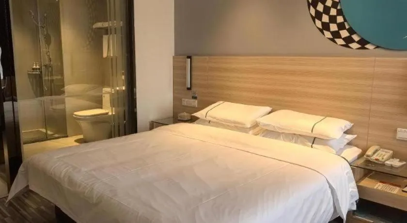 Bed in City Comfort Inn Huanggang Qichun Exhibition Center