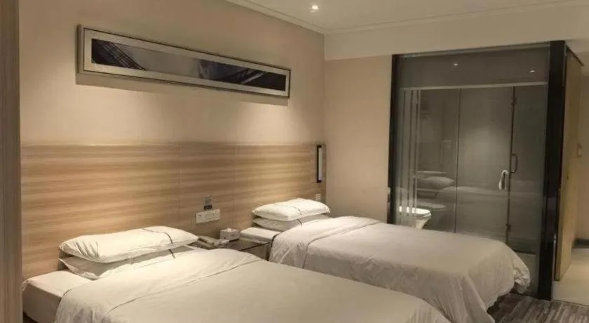 Bed in City Comfort Inn Huanggang Qichun Exhibition Center