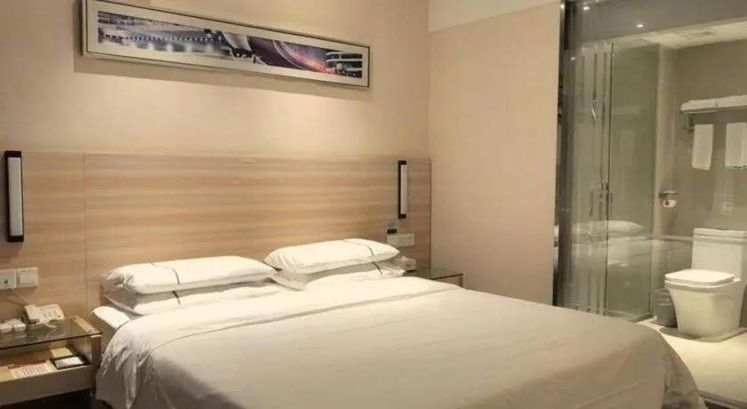 Bed in City Comfort Inn Huanggang Qichun Exhibition Center