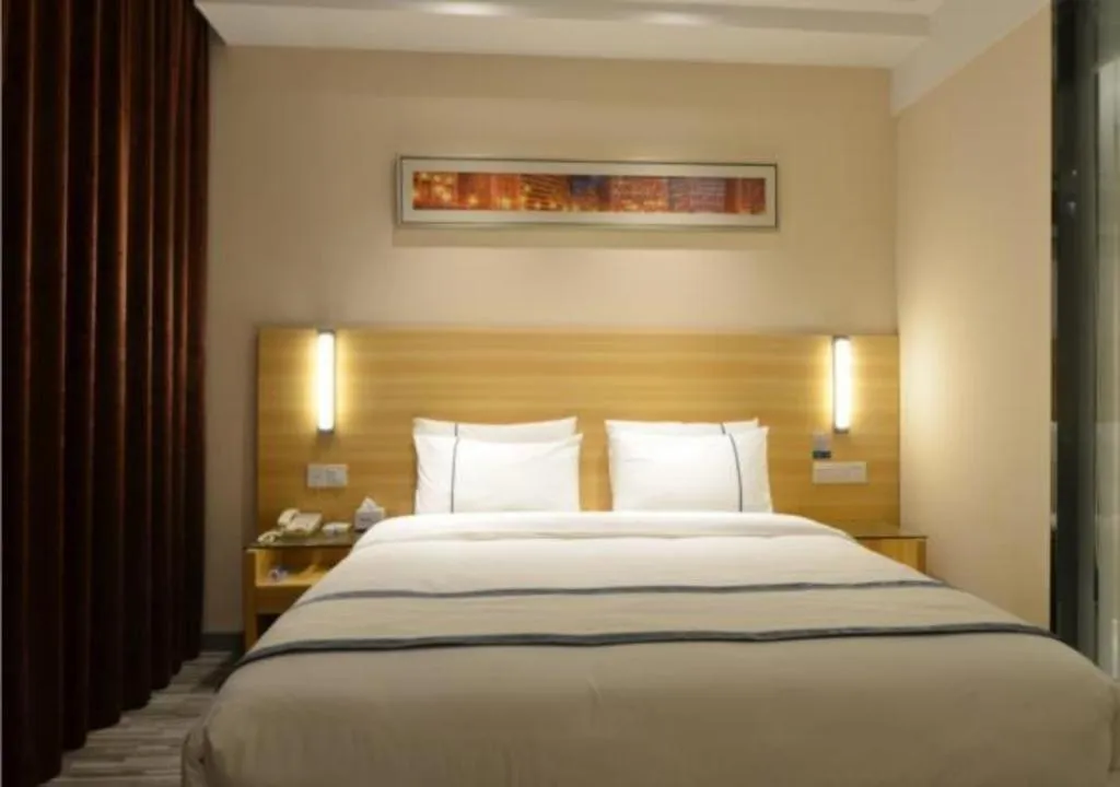 Bed in City Comfort Inn Huanggang Qichun Exhibition Center