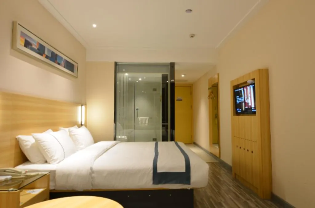 Bed in City Comfort Inn Huanggang Qichun Exhibition Center