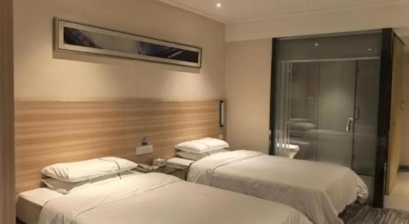 Bed in City Comfort Inn Huanggang Qichun Exhibition Center