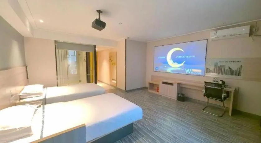 Bed in City Comfort Inn Huanggang Qichun Exhibition Center