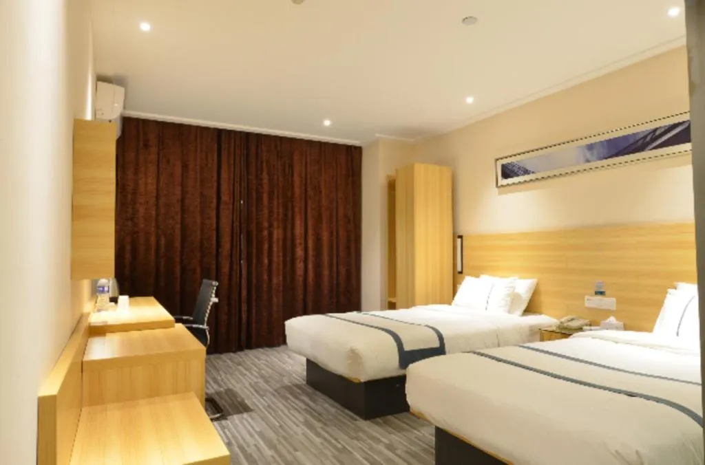 Bed in City Comfort Inn Huanggang Qichun Exhibition Center