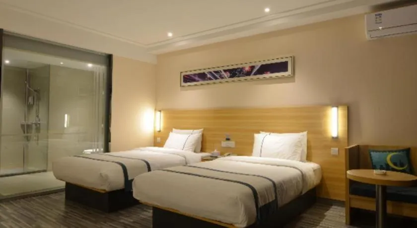 Bed in City Comfort Inn Huanggang Qichun Exhibition Center