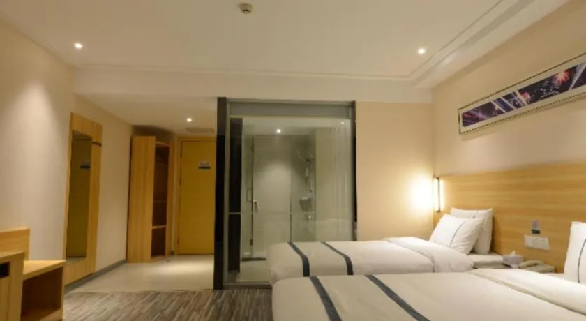 Bed in City Comfort Inn Huanggang Qichun Exhibition Center