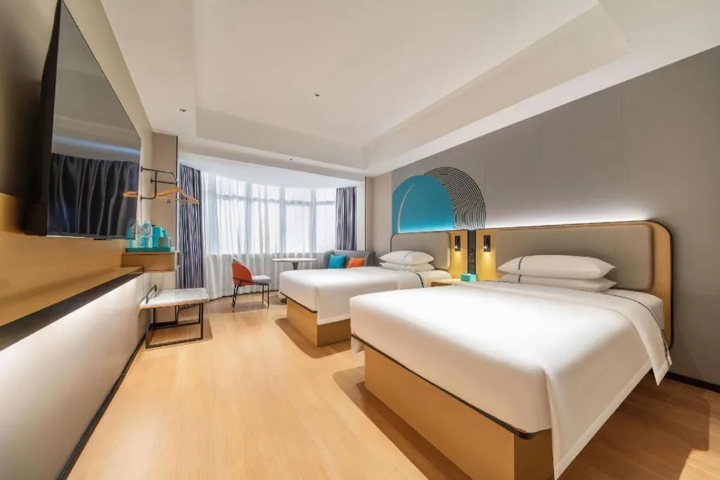 Bed in City Comfort Inn Zhanjiang Mazhang Pedestrian Street High-speed Railway West Station