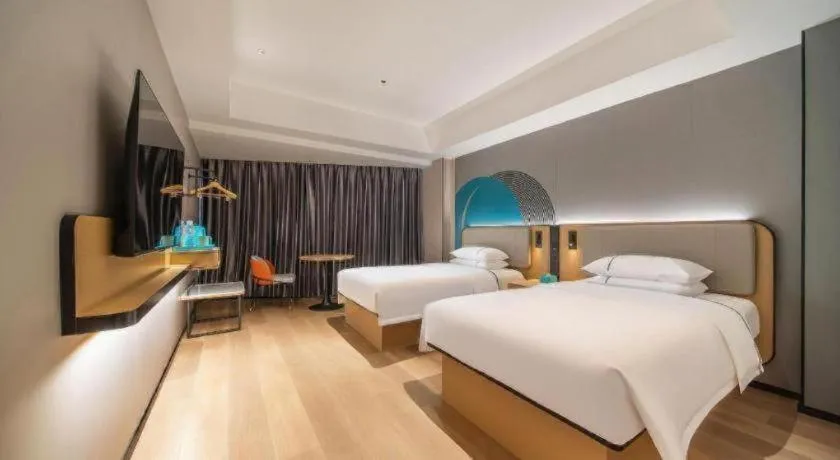 Bed in City Comfort Inn Zhanjiang Mazhang Pedestrian Street High-speed Railway West Station