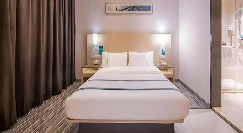 Bed in City Comfort Inn Nanning Qingxiu Wanda Dongge Road Metro Station