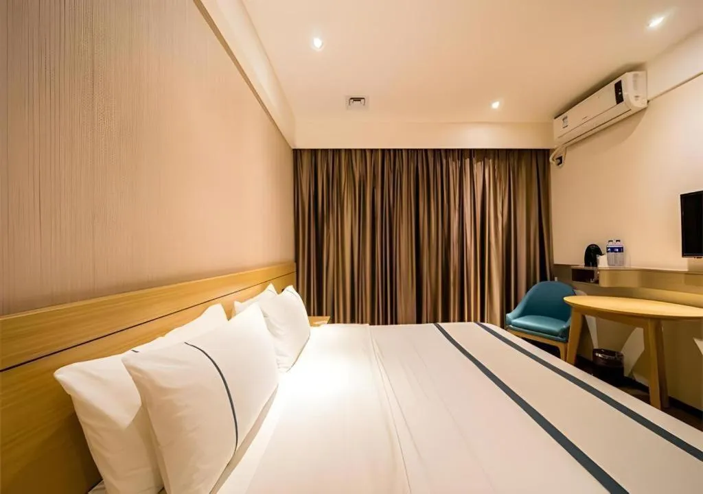 Bed in City Comfort Inn Wuhan International Expo Center Qianjin Village Metro Station