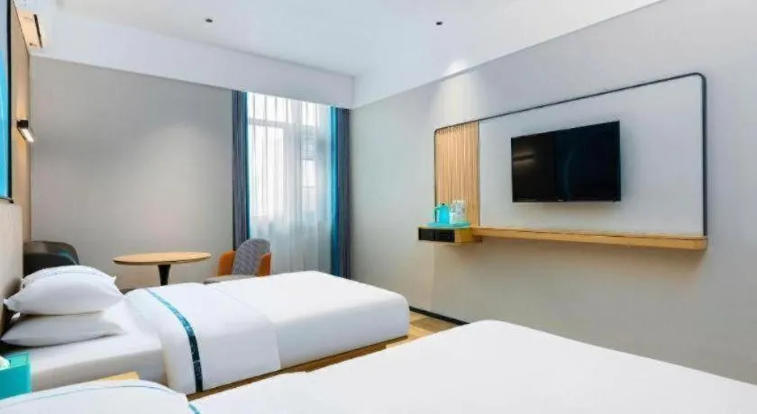 Bed in City Comfort Inn Wuhan International Expo Center Qianjin Village Metro Station