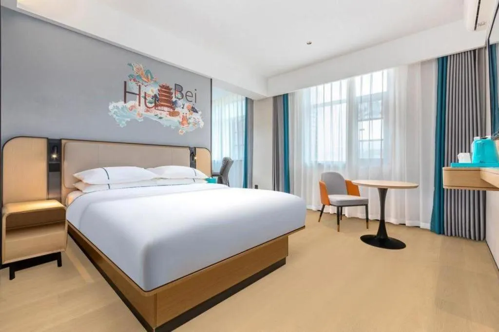 Bed in City Comfort Inn Wuhan International Expo Center Qianjin Village Metro Station