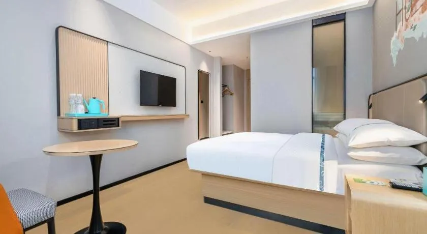 Bed in City Comfort Inn Wuhan International Expo Center Qianjin Village Metro Station