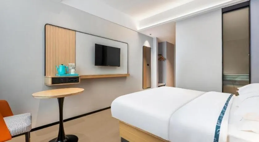 Bed in City Comfort Inn Wuhan International Expo Center Qianjin Village Metro Station