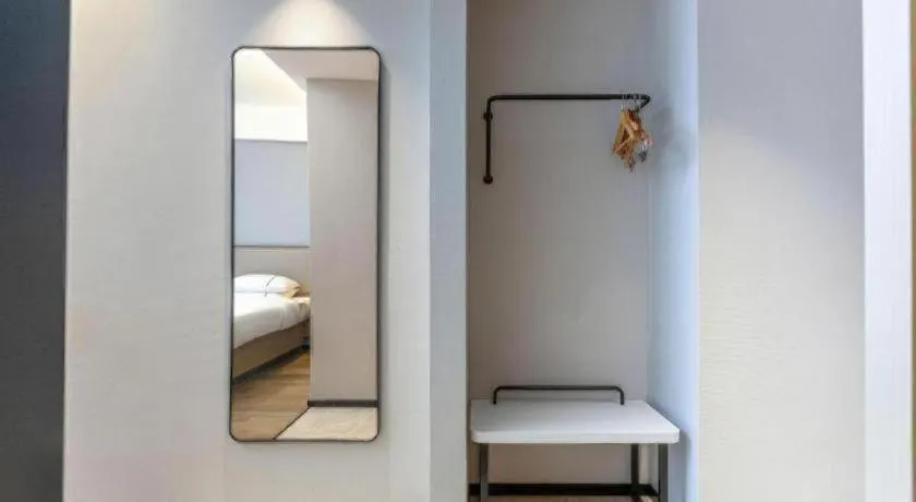 Bed in City Comfort Inn Wuhan International Expo Center Qianjin Village Metro Station