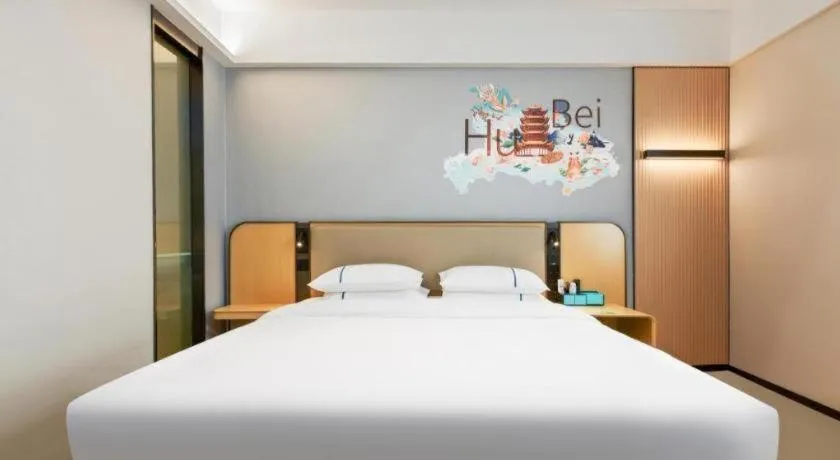 Bed in City Comfort Inn Wuhan International Expo Center Qianjin Village Metro Station