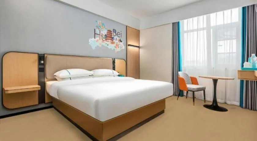 Bed in City Comfort Inn Wuhan International Expo Center Qianjin Village Metro Station