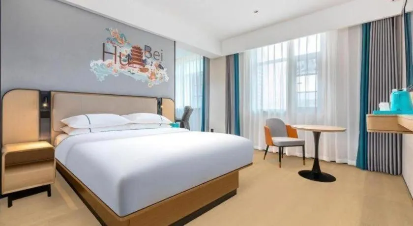 Bed in City Comfort Inn Wuhan International Expo Center Qianjin Village Metro Station