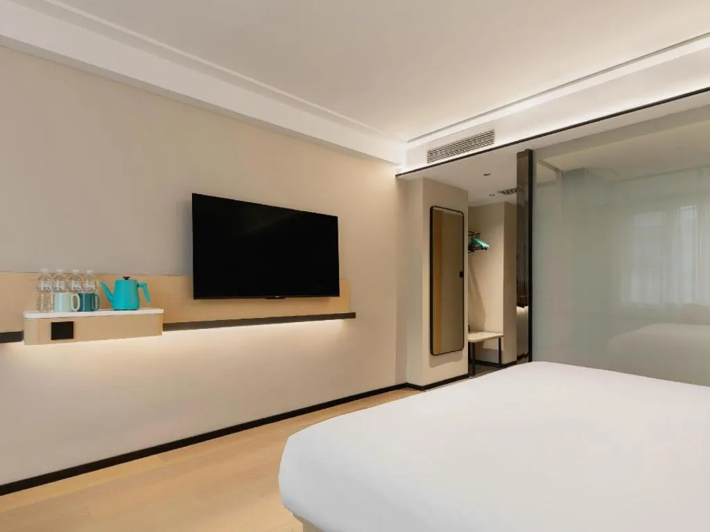 Bed in City Comfort Inn Wuhan International Expo Center Qianjin Village Metro Station