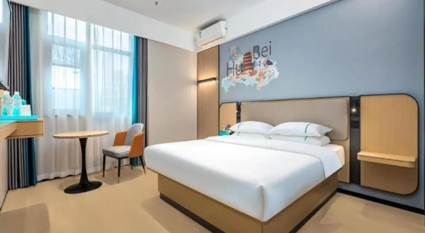 Bed in City Comfort Inn Wuhan International Expo Center Qianjin Village Metro Station