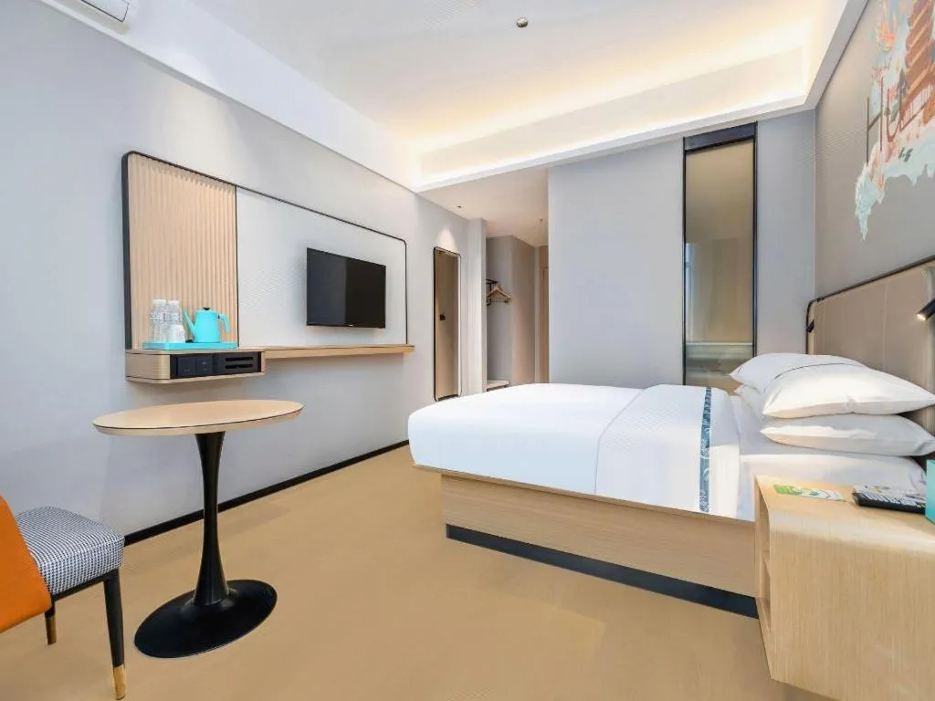 Bed in City Comfort Inn Wuhan International Expo Center Qianjin Village Metro Station