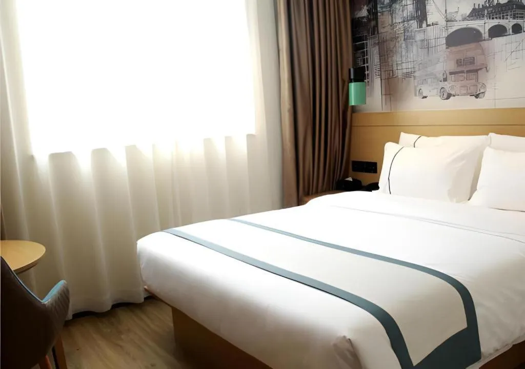 Bed in City Comfort Inn Yingcheng Walking Street