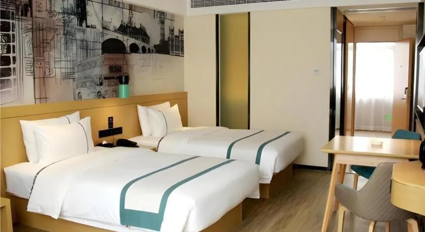 Bed in City Comfort Inn Yingcheng Walking Street