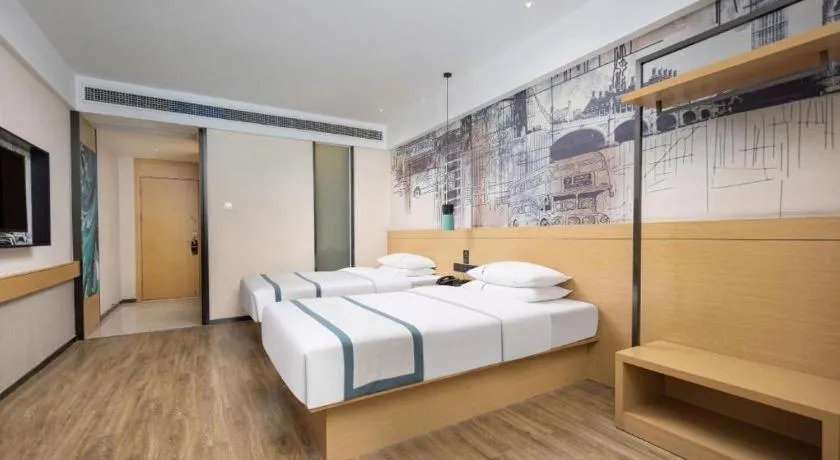 Bed in City Comfort Inn Yingcheng Walking Street