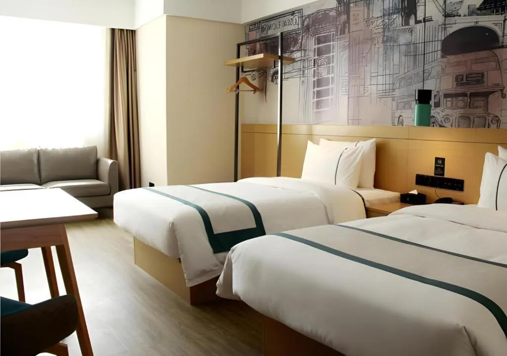 Bed in City Comfort Inn Yingcheng Walking Street
