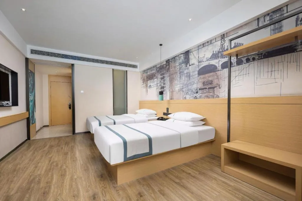 Bed in City Comfort Inn Yingcheng Walking Street