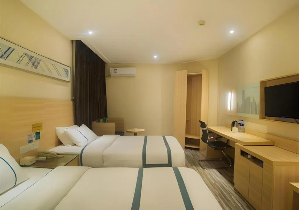 Bed in City Comfort Inn Liuzhou High-speed Railway Station