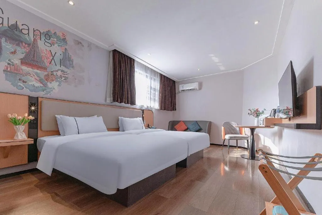 Bed in City Comfort Inn Liuzhou High-speed Railway Station