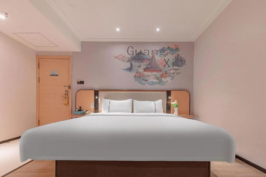 Bed in City Comfort Inn Liuzhou High-speed Railway Station