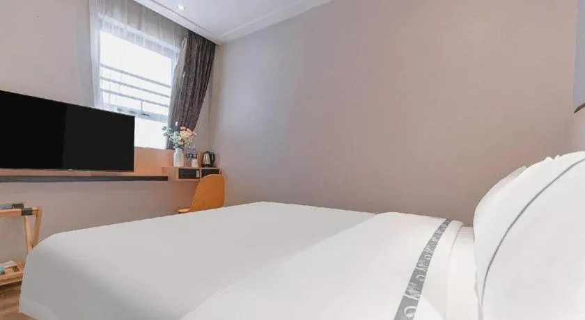 Bed in City Comfort Inn Liuzhou High-speed Railway Station