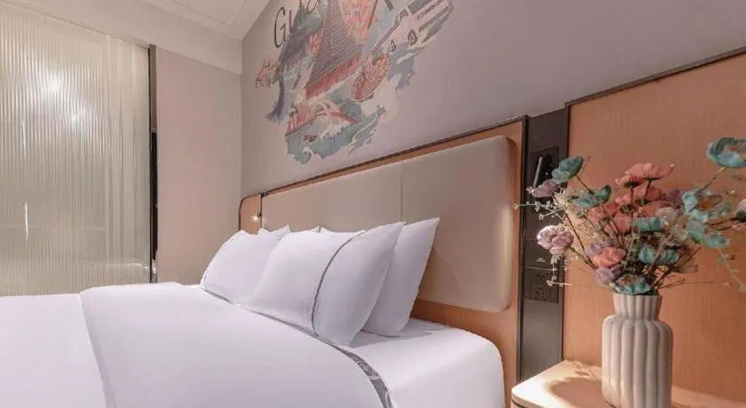 Bed in City Comfort Inn Liuzhou High-speed Railway Station