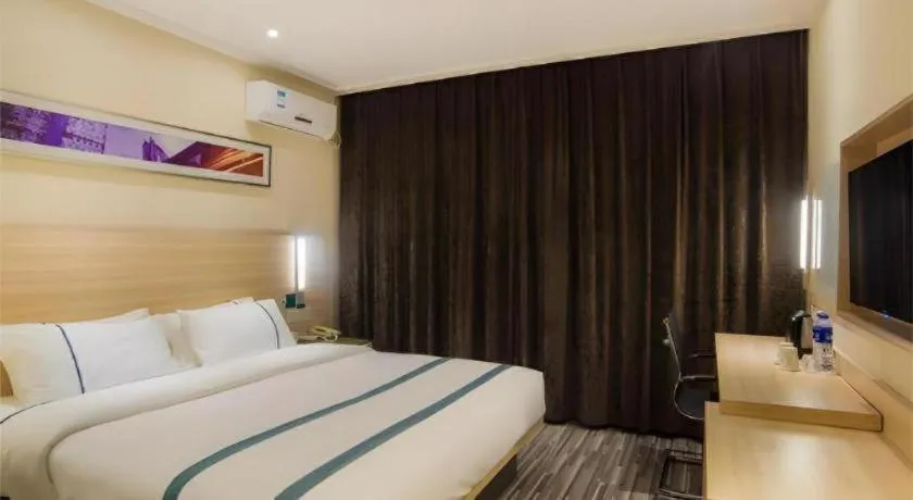 Bed in City Comfort Inn Liuzhou High-speed Railway Station