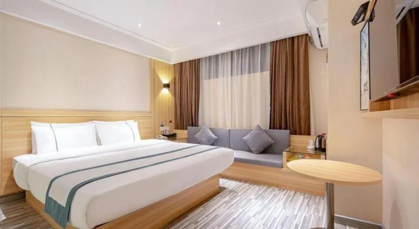 Bed in City Comfort Inn Liuzhou Wuxing Walking Street