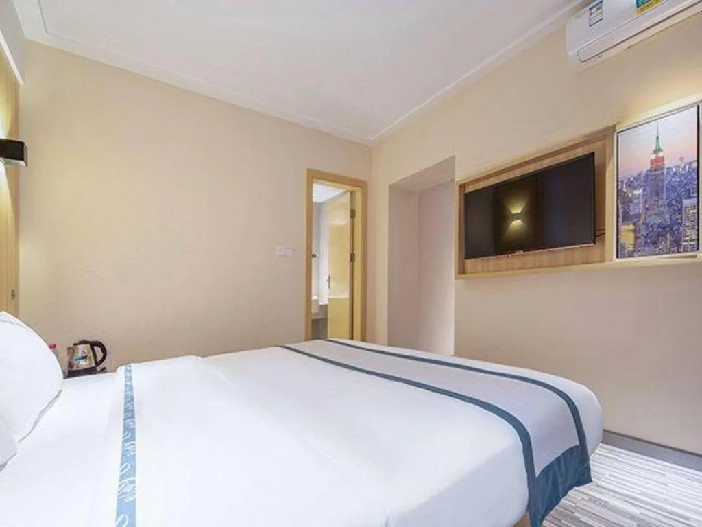 Bed in City Comfort Inn Liuzhou Wuxing Walking Street