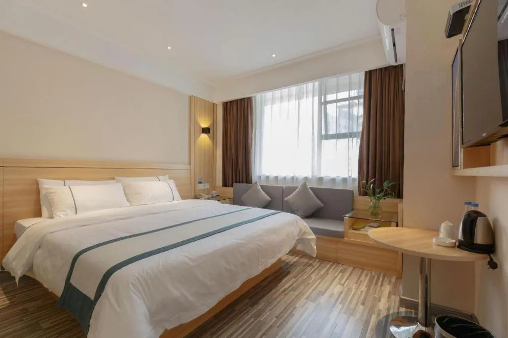 Bed in City Comfort Inn Liuzhou Wuxing Walking Street