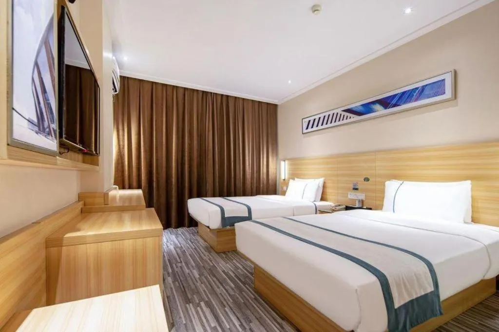 Bed in City Comfort Inn Liuzhou Wuxing Walking Street