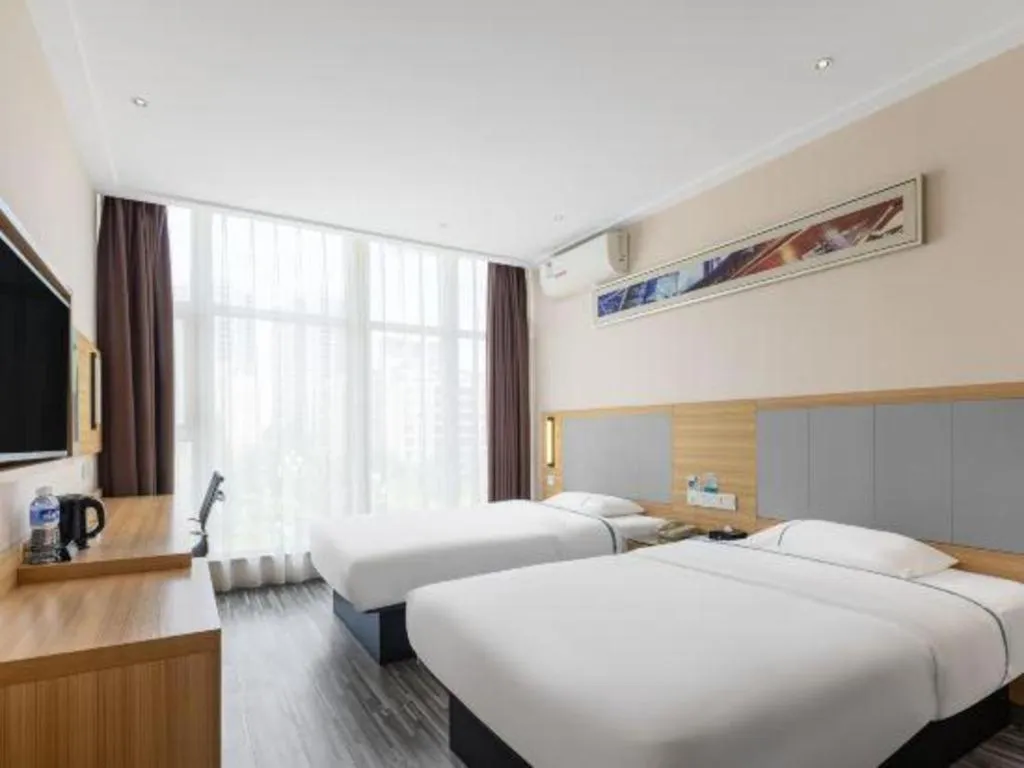 Bed in City Comfort Inn Zhuhai University Town Tangjiawan Plaza
